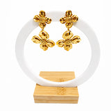 Boucles d’oreilles ALICIA – Fleurs martelées dorées en acier inoxydable