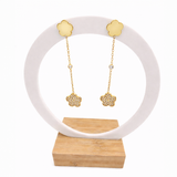 Boucles d’oreilles AMBRE – Fleur dorée strassée pendante en acier inoxydable